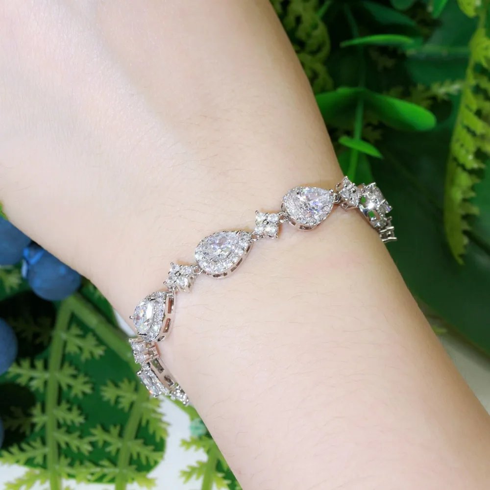 CWWZircons - Pulsera de tenis con circonita cúbica en forma de gota de agua grande y brillante, color oro rosa, para mujer, joyería moderna para fiestas y bodas CB238