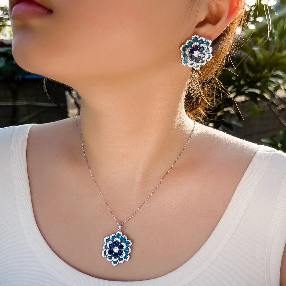 CWWZircons - Pendientes y collar con colgante de flor de circonita cúbica azul de lujo Art Deco para mujer, conjuntos de joyería de fiesta T764 CWWZircons - Pendientes y collar con colgante de flor de circonita cúbica azul de lujo Art Deco para mujer, conjuntos de joyería de fiesta T764