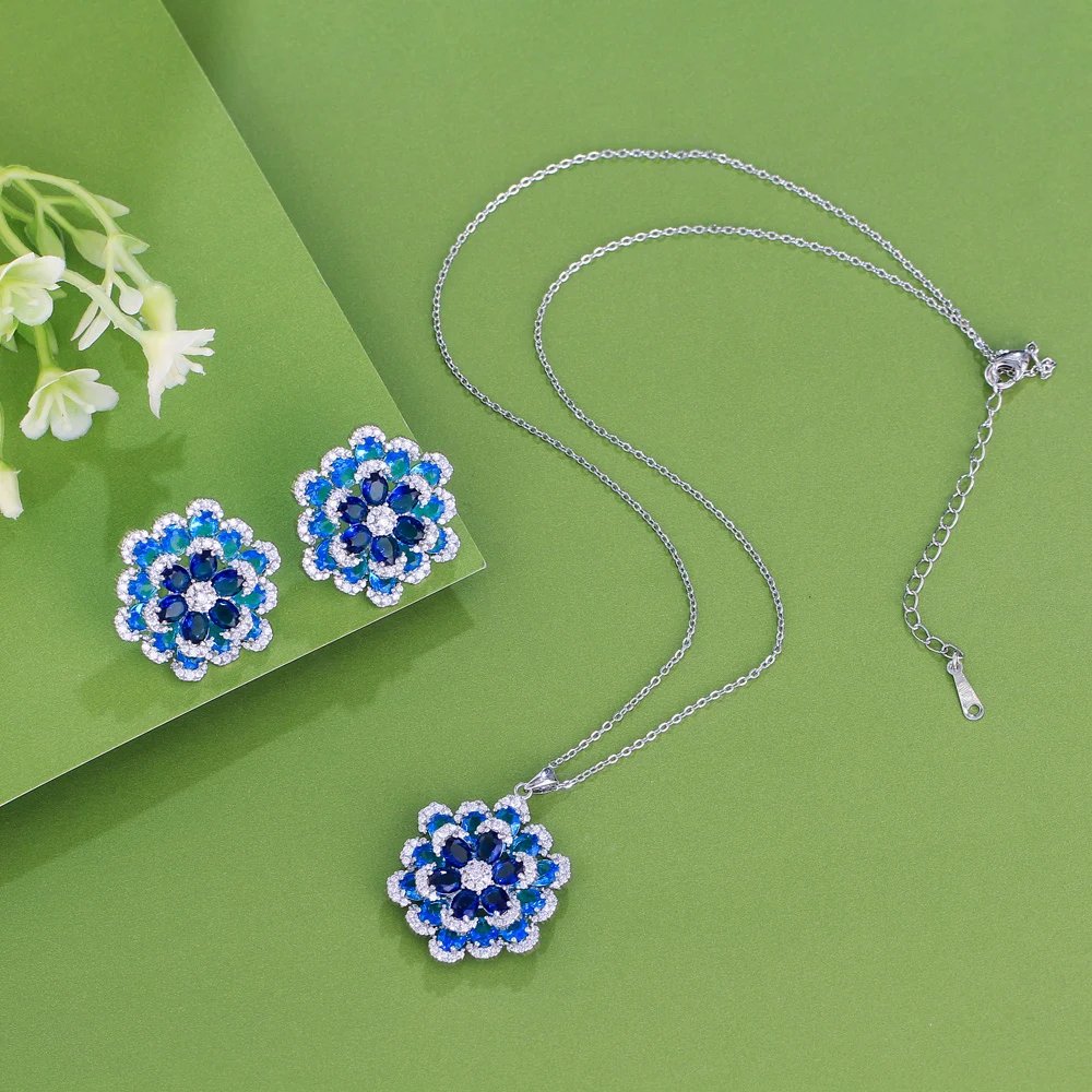 CWWZircons - Pendientes y collar con colgante de flor de circonita cúbica azul de lujo Art Deco para mujer, conjuntos de joyería de fiesta T764 CWWZircons - Pendientes y collar con colgante de flor de circonita cúbica azul de lujo Art Deco para mujer, conjuntos de joyería de fiesta T764