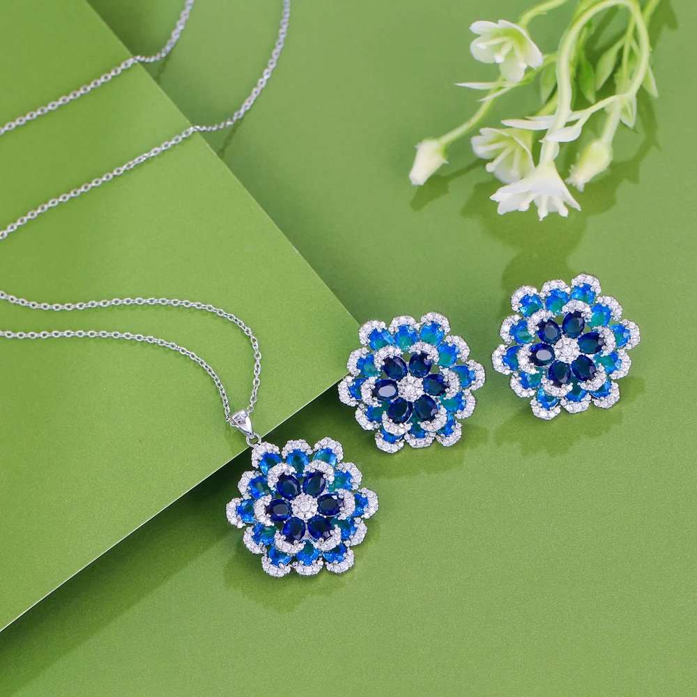 CWWZircons - Pendientes y collar con colgante de flor de circonita cúbica azul de lujo Art Deco para mujer, conjuntos de joyería de fiesta T764 CWWZircons - Pendientes y collar con colgante de flor de circonita cúbica azul de lujo Art Deco para mujer, conjuntos de joyería de fiesta T764