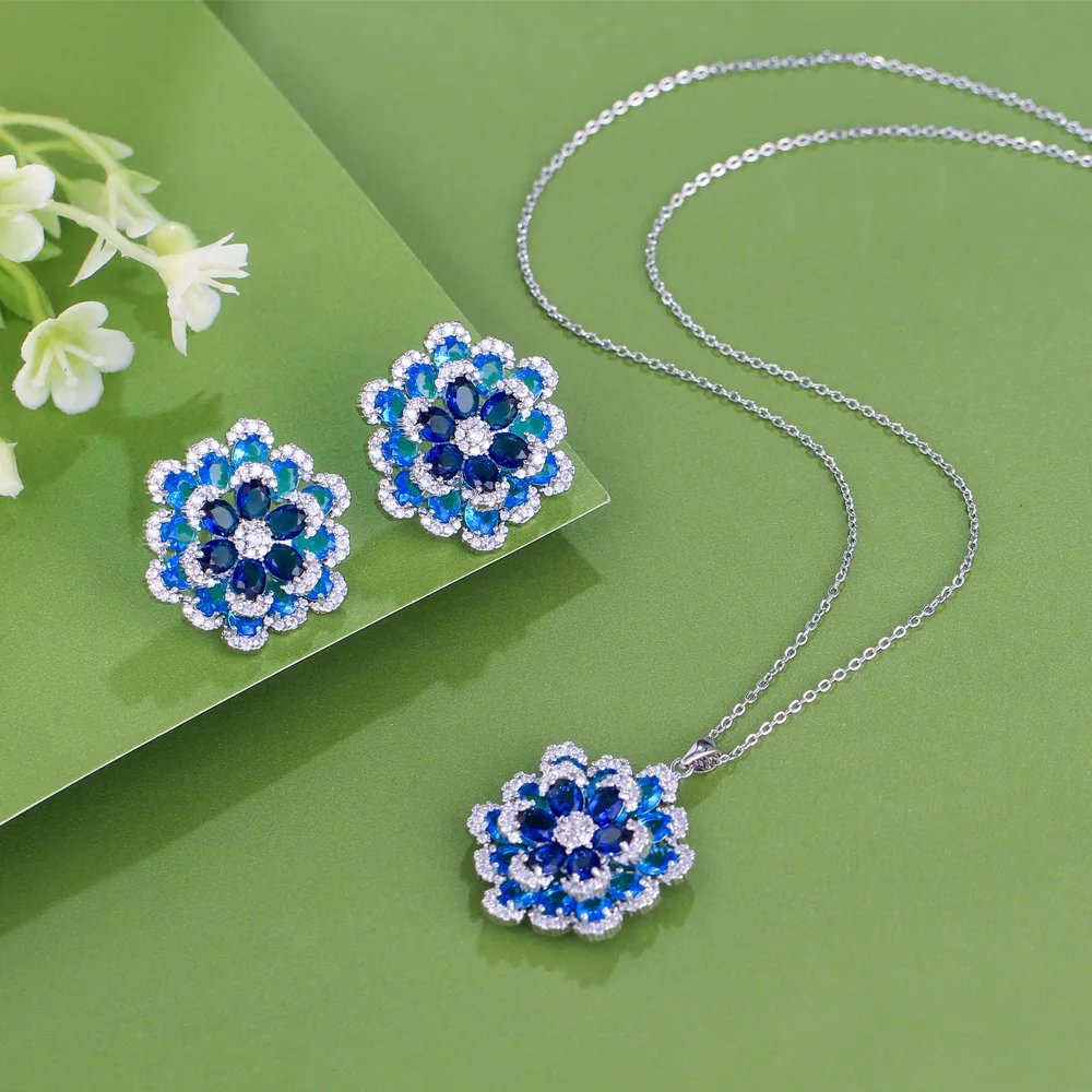 CWWZircons - Pendientes y collar con colgante de flor de circonita cúbica azul de lujo Art Deco para mujer, conjuntos de joyería de fiesta T764 CWWZircons - Pendientes y collar con colgante de flor de circonita cúbica azul de lujo Art Deco para mujer, conjuntos de joyería de fiesta T764
