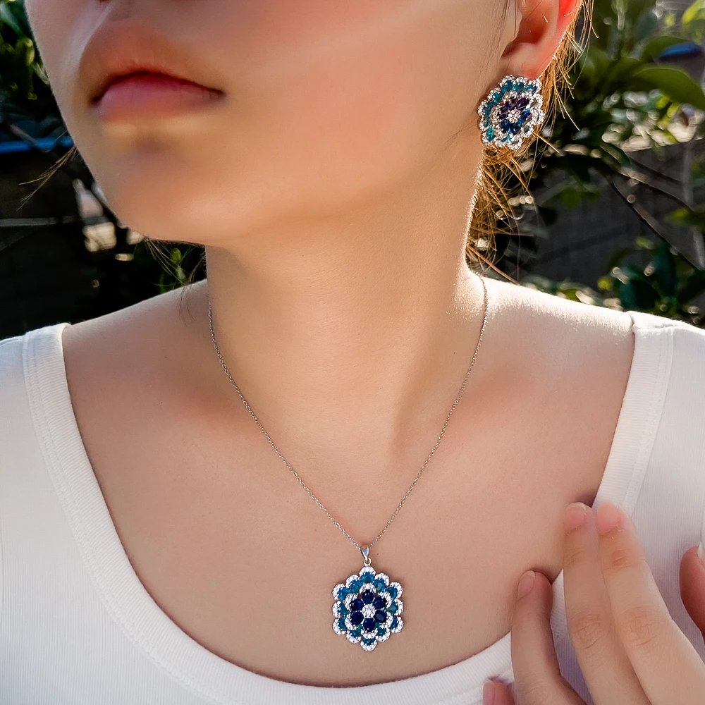 CWWZircons - Pendientes y collar con colgante de flor de circonita cúbica azul de lujo Art Deco para mujer, conjuntos de joyería de fiesta T764 CWWZircons - Pendientes y collar con colgante de flor de circonita cúbica azul de lujo Art Deco para mujer, conjuntos de joyería de fiesta T764