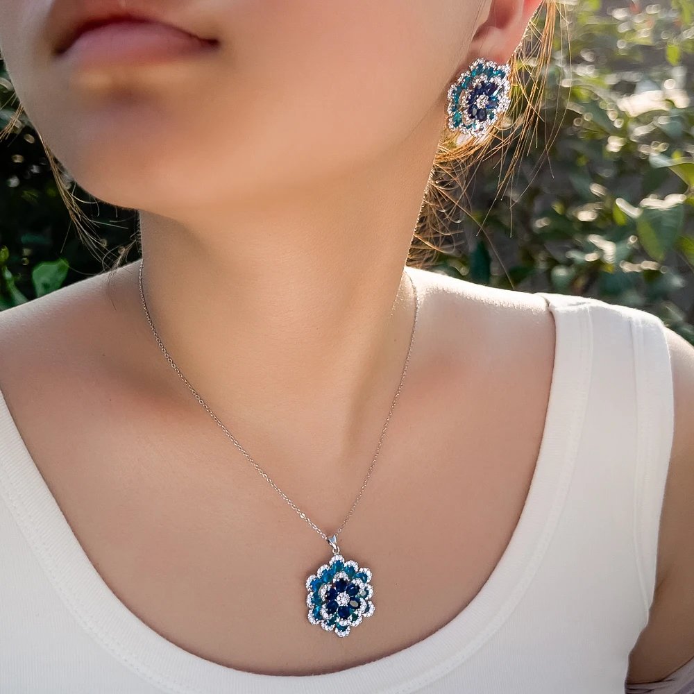 CWWZircons - Pendientes y collar con colgante de flor de circonita cúbica azul de lujo Art Deco para mujer, conjuntos de joyería de fiesta T764 CWWZircons - Pendientes y collar con colgante de flor de circonita cúbica azul de lujo Art Deco para mujer, conjuntos de joyería de fiesta T764