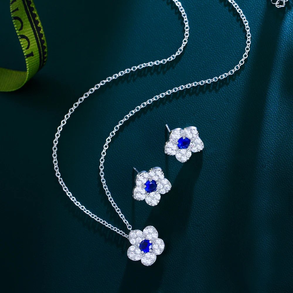 CWWZircons - Nueva joyería coreana de moda con circonitas cúbicas AAA y flores pavimentadas para mujer, conjuntos de joyas con circonitas azul oscuro T138