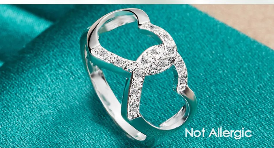 Anillo DOTEFFIL de plata de ley 925 con doble corazón y circonita AAA para mujer, ideal para bodas, compromisos y fiestas.