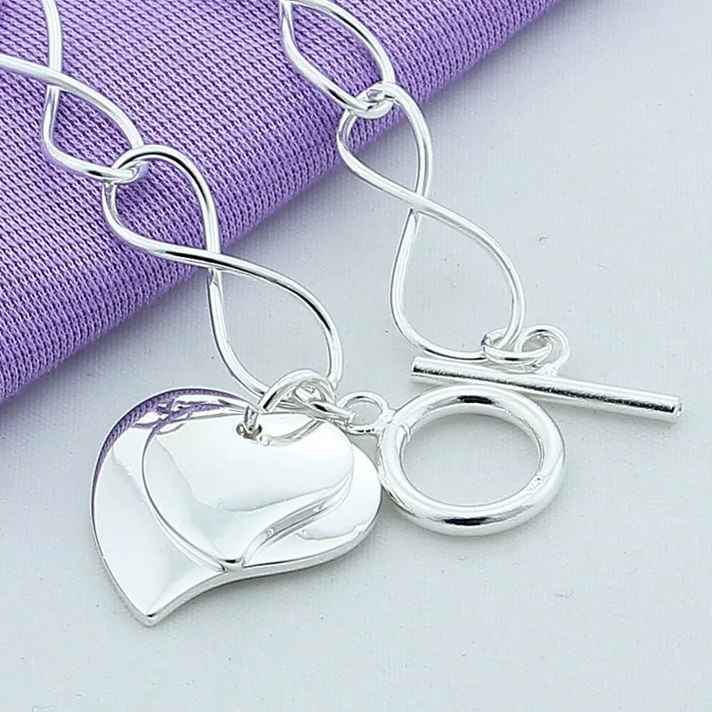 Pulsera DOTEFFIL de plata de ley 925 con dos corazones para mujer, ideal como amuleto para boda, compromiso o fiesta.