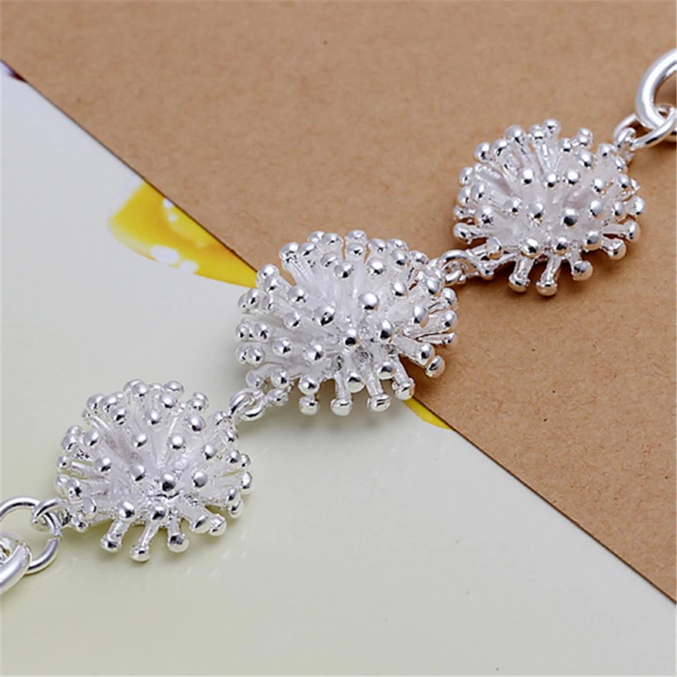 Pulsera DOTEFFIL con colgante de coral en plata de ley 925 para mujer, ideal como amuleto para bodas, compromisos y fiestas.