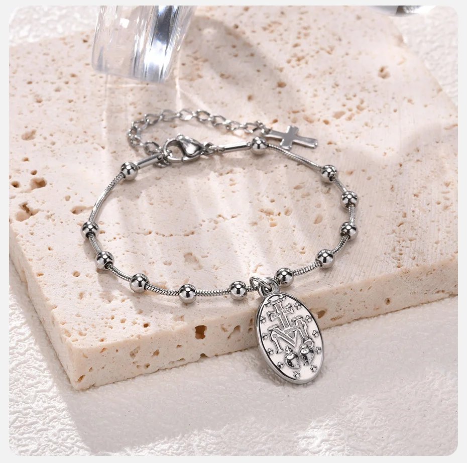 Pulsera de rosario Vnox para mujeres y niñas, de acero inoxidable chapado en oro, con cruz religiosa y oración de la Virgen María. Pulsera de rosario Vnox para mujeres y niñas, de acero inoxidable chapado en oro, con cruz religiosa y oración de la Virgen María.