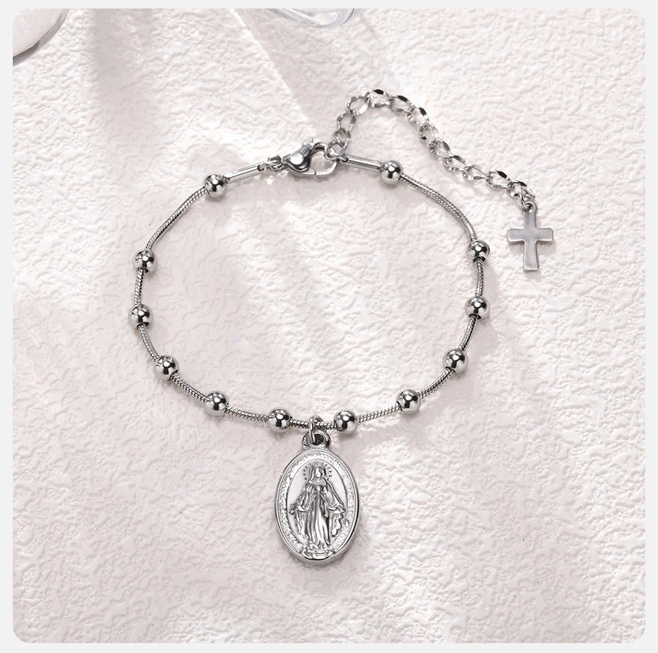 Pulsera de rosario Vnox para mujeres y niñas, de acero inoxidable chapado en oro, con cruz religiosa y oración de la Virgen María. Pulsera de rosario Vnox para mujeres y niñas, de acero inoxidable chapado en oro, con cruz religiosa y oración de la Virgen María.